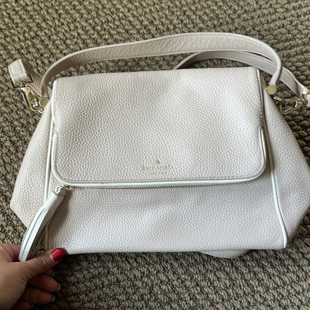 Kate Spade cream colored crossbody purse,